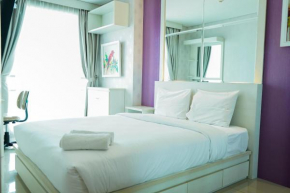 City View 1BR Apartment at Woodland Park Residence By Travelio